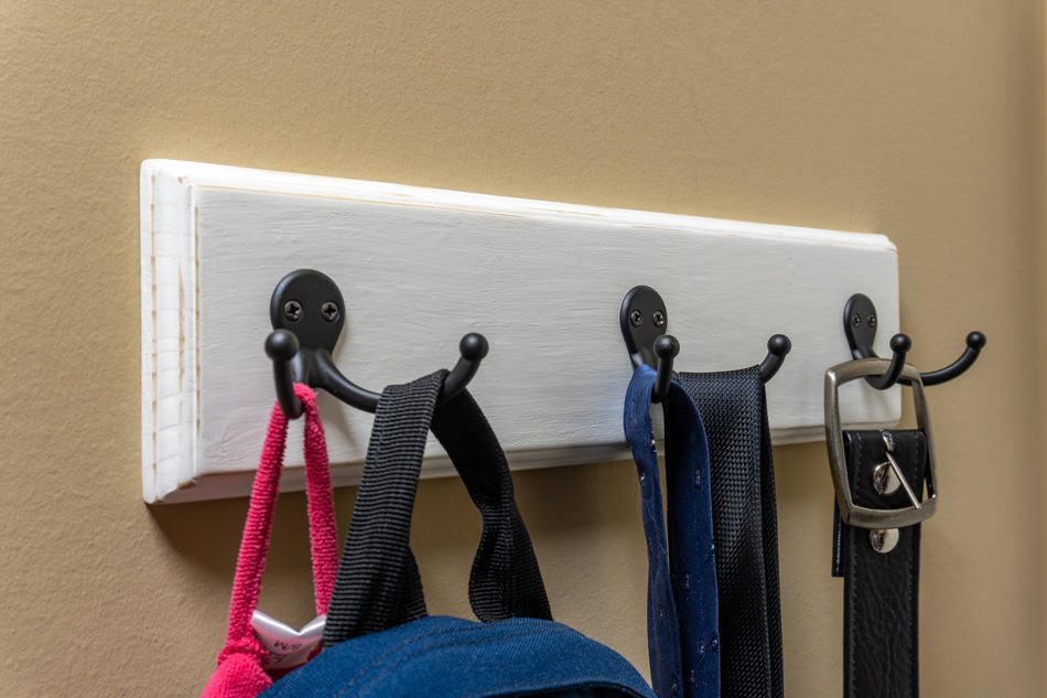 Closet belt hanger with belts hanging on it