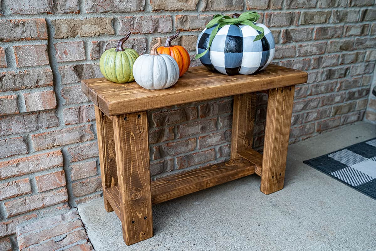Small decorative bench on front porch